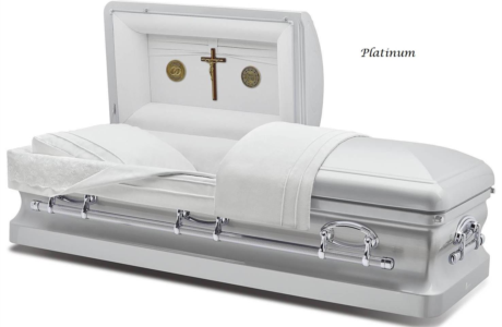 White satin casket with cross in the head panel on a light background