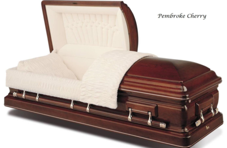 Cherry wood casket with open lid and white quilted lining