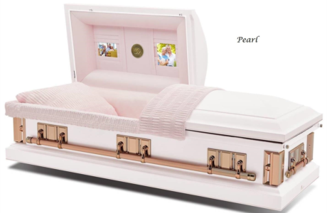 White casket with pink interior and gold trim, open lid showing matching pink bedding.