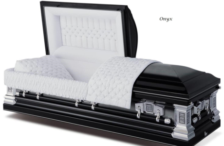 Black and silver open casket with white interior and patterned lining