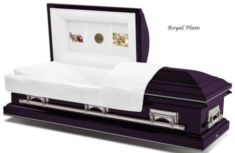 Purple casket with white satin interior and open lid, displayed on a white background