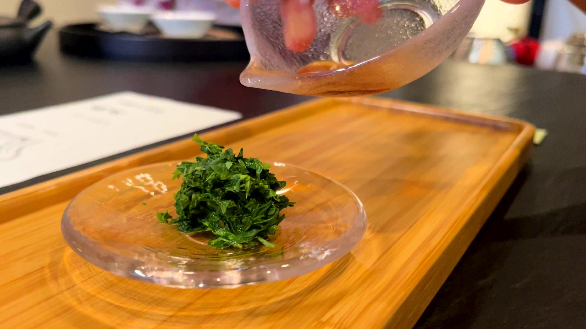 Tea leaves on a glass plate