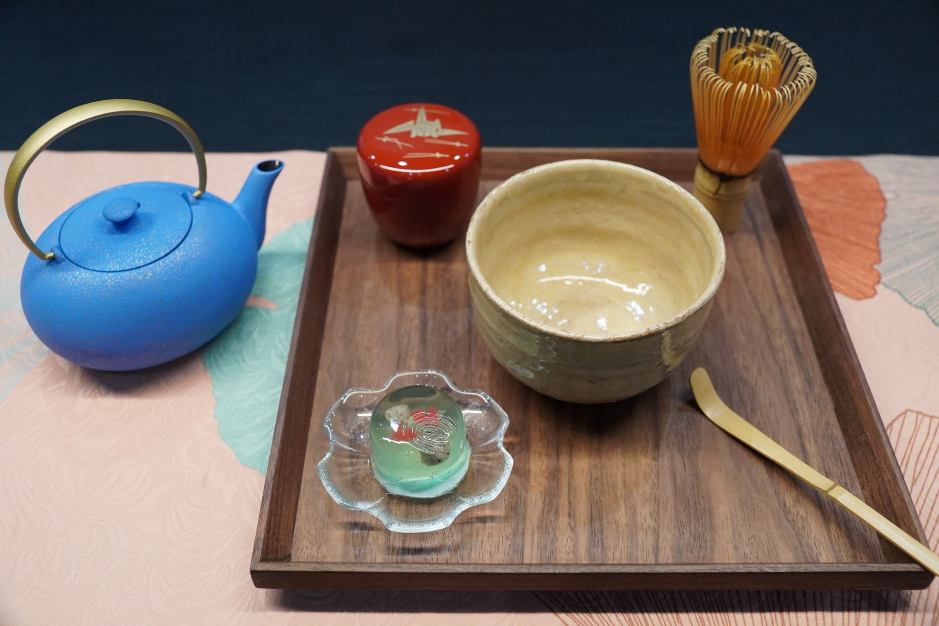A matcha set and sweets on a tray