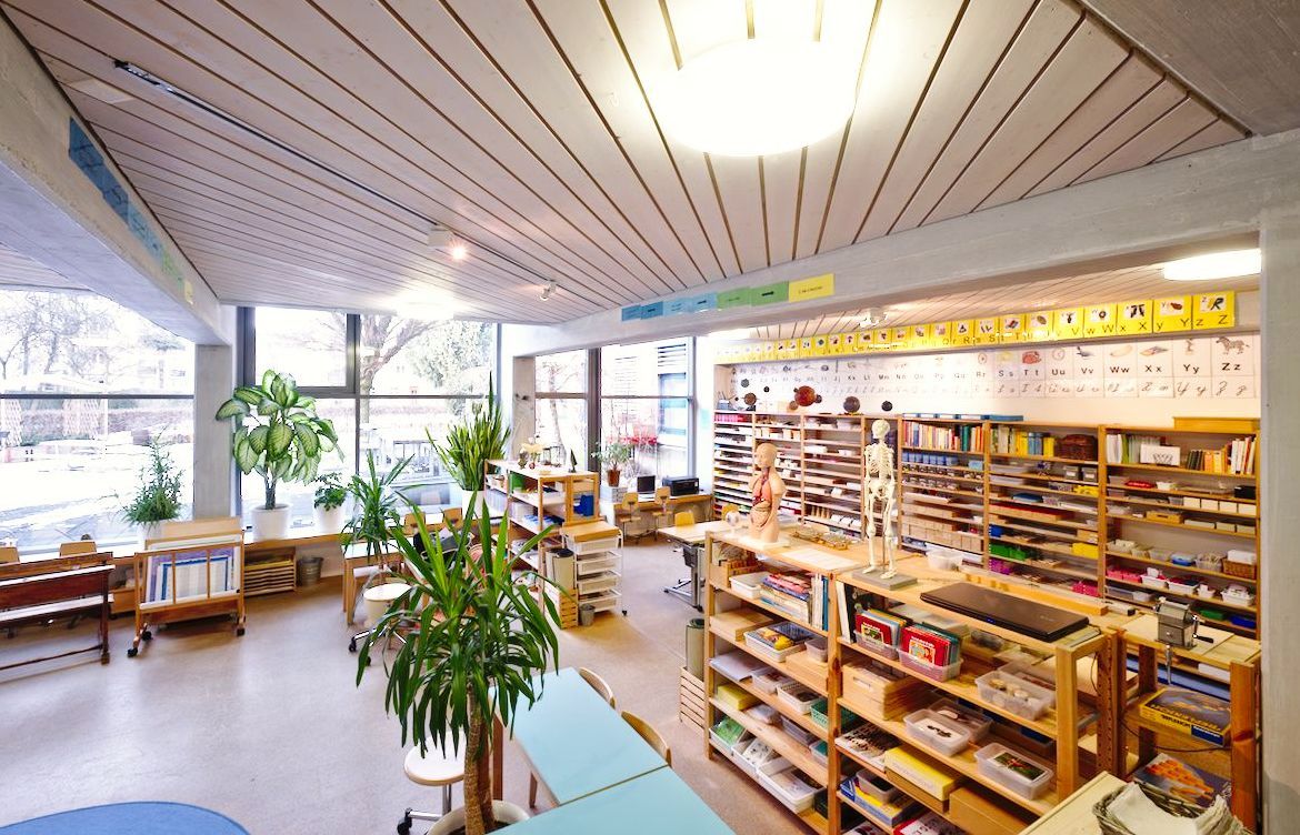 A large room with a lot of shelves and tables