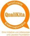 A logo for a company called qualikita in a speech bubble.