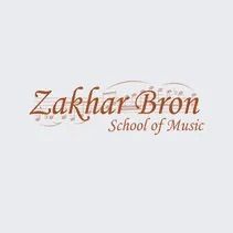 The logo for zakhar bron school of music is on a white background.