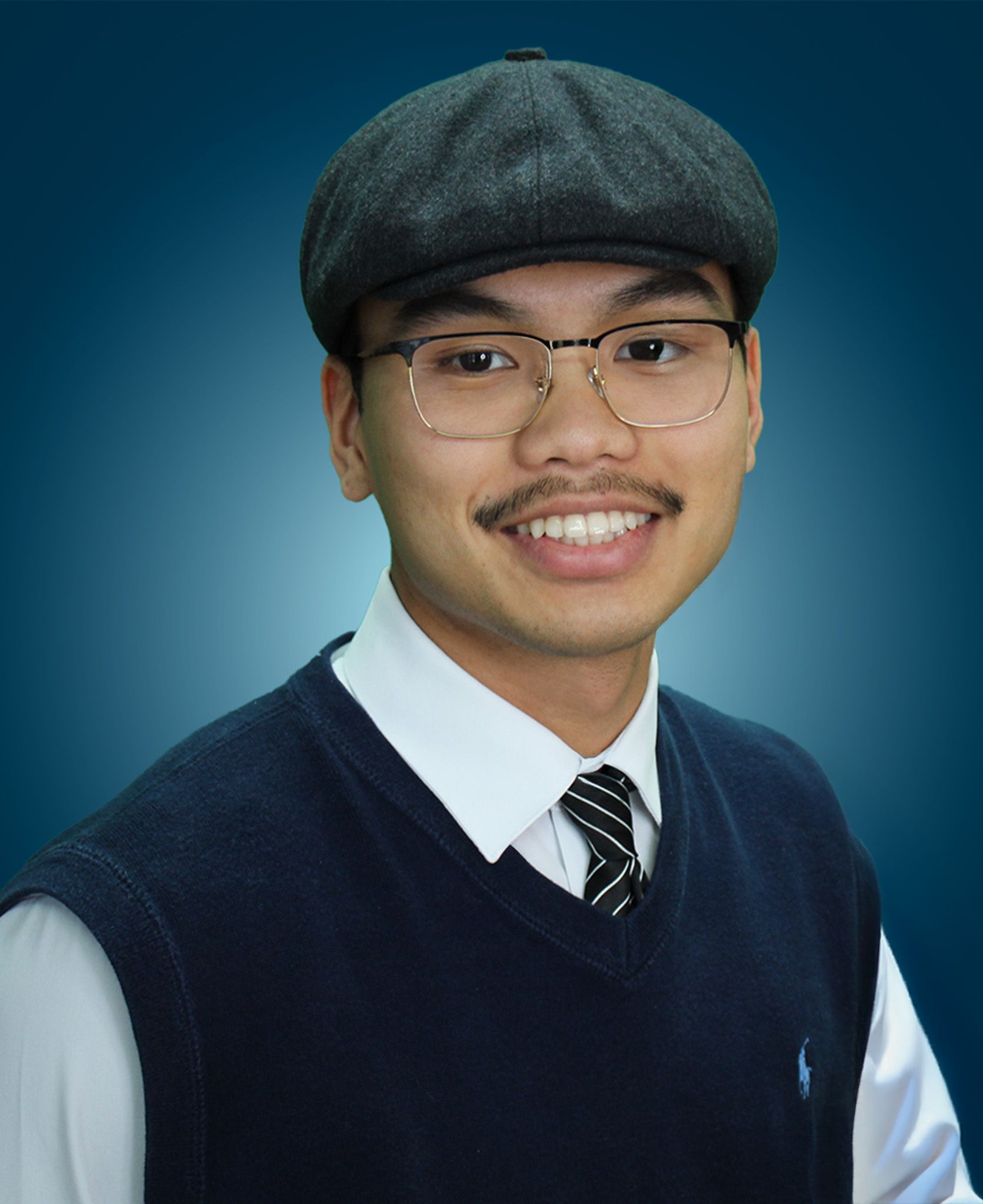 Headshot of Winston Huynh, EIT against a blue gradient background.
