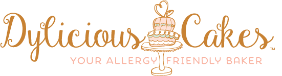 Gold logo for “Dylicious Cakes” with a cake illustration and the tagline “Your allergy friendly baker”