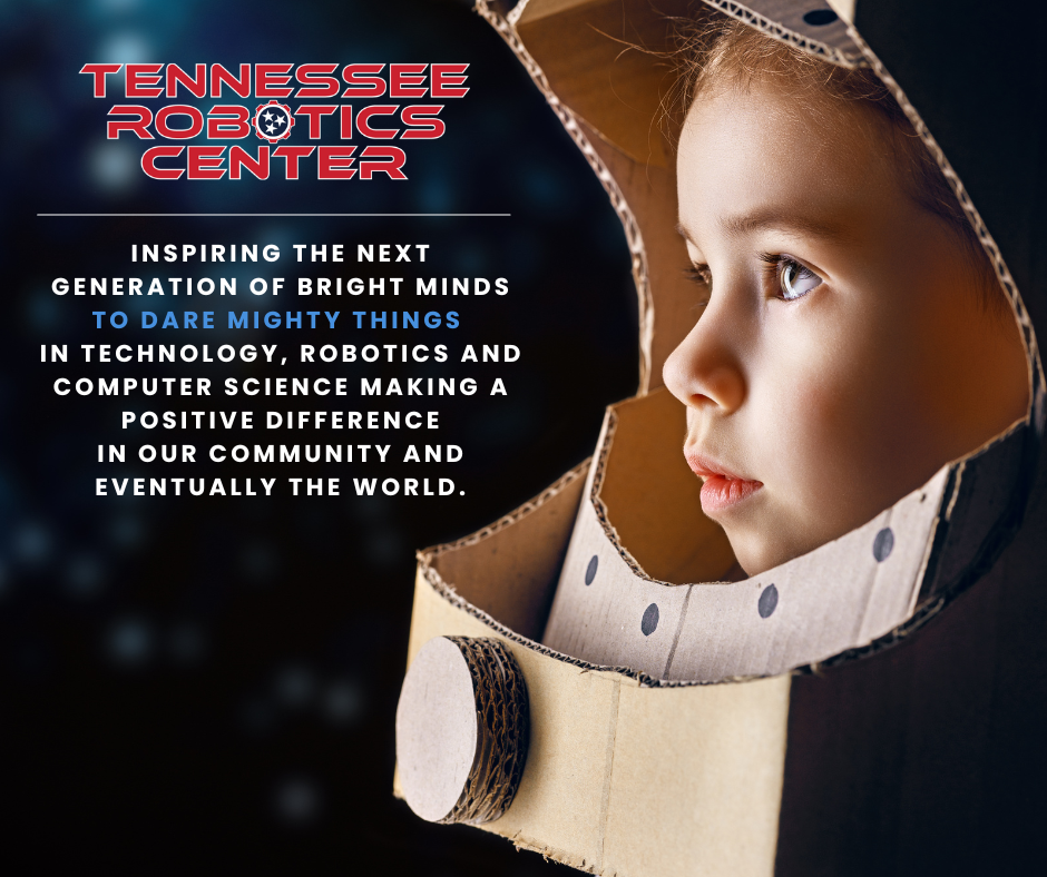 A young girl wearing a cardboard helmet, with the Tennessee Robotics Center logo and text: