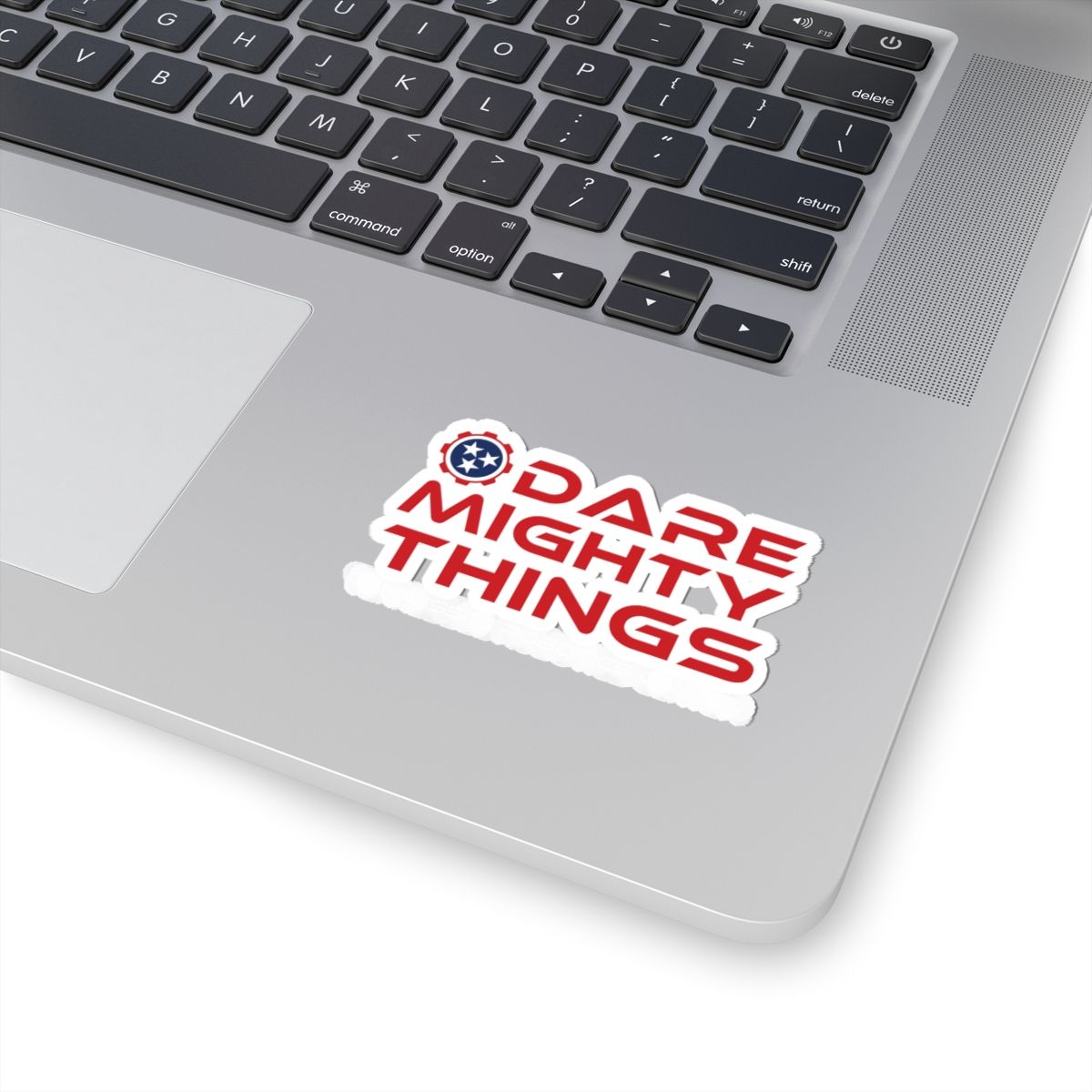 Red logo reading “Dare Mighty Things” with a star emblem on a white background