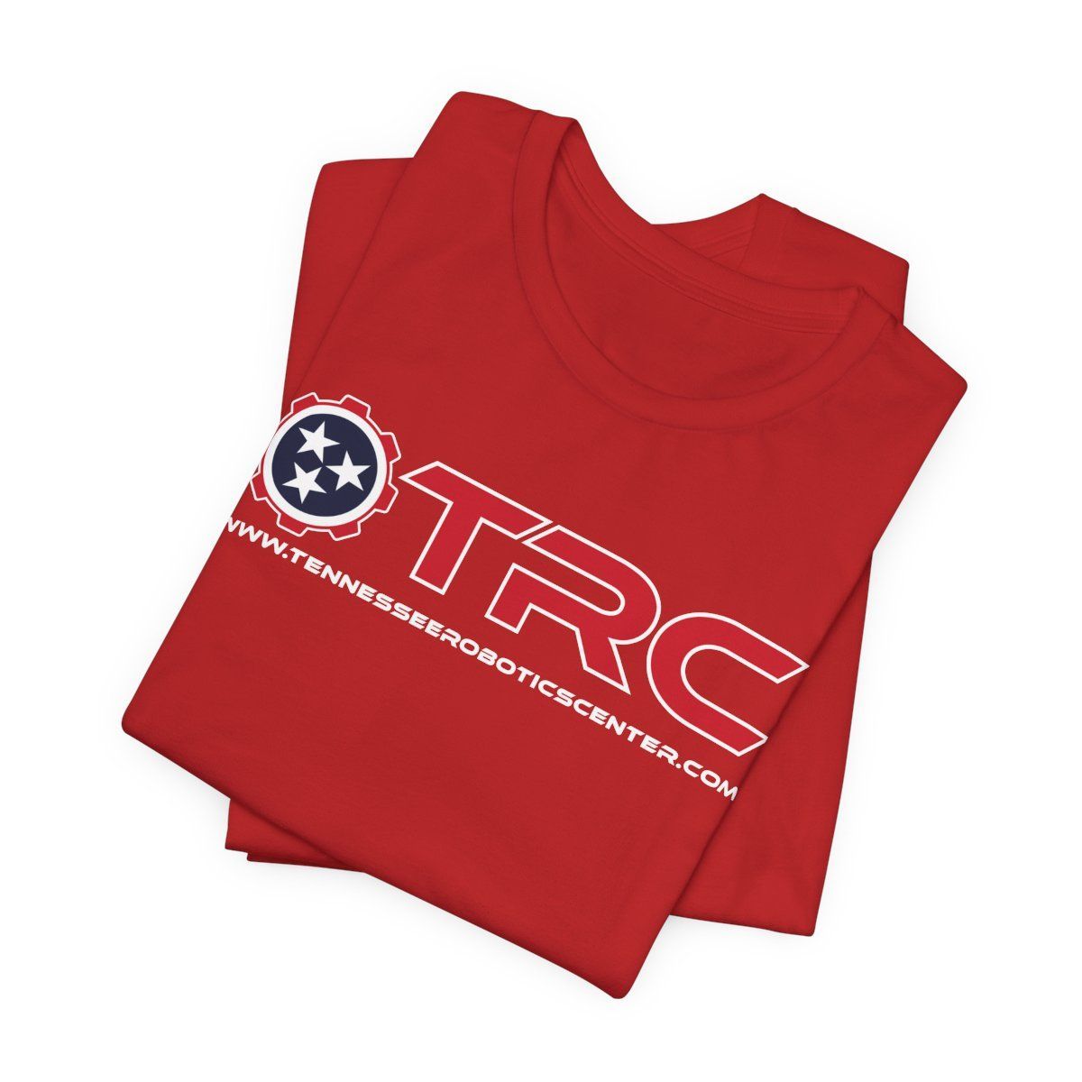 Folded red T-shirt with a large TRC logo and white text printed across the front.