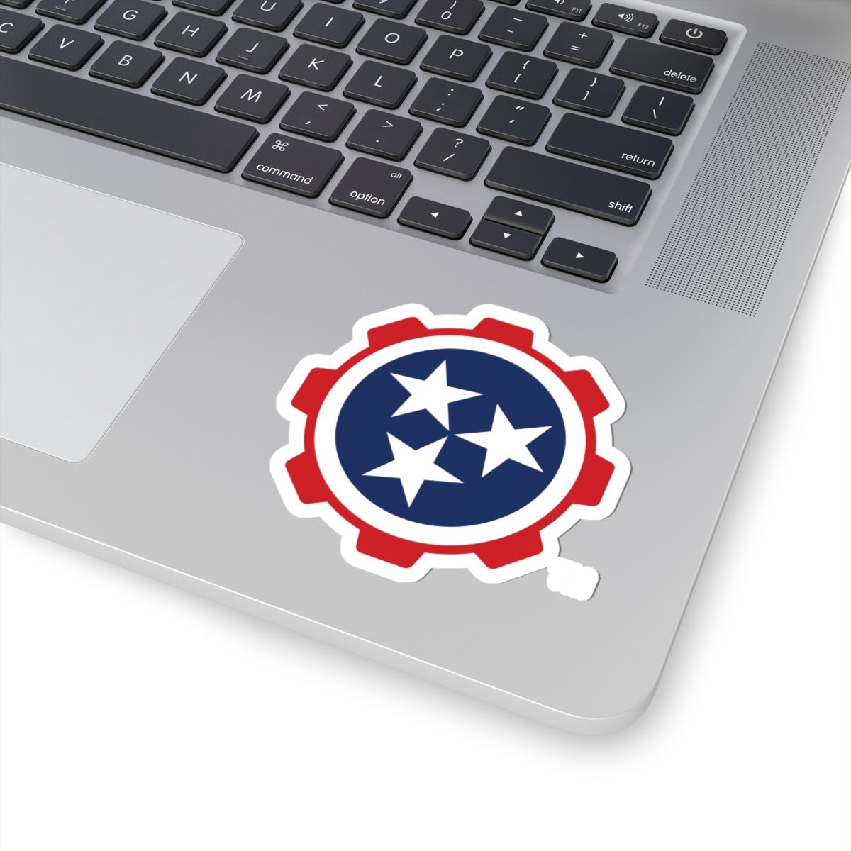 Red gear icon with a blue center and three white stars