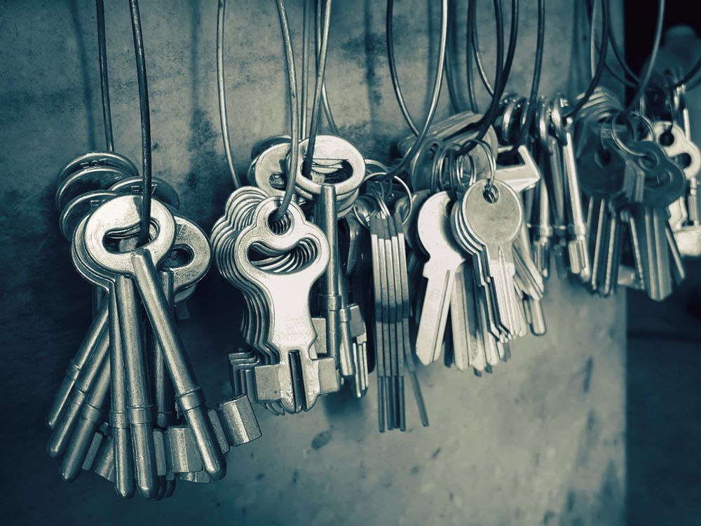 A Bunch Of Keys Are Hanging On A String — Port Macquarie Locksmiths In Thrumster, NSW