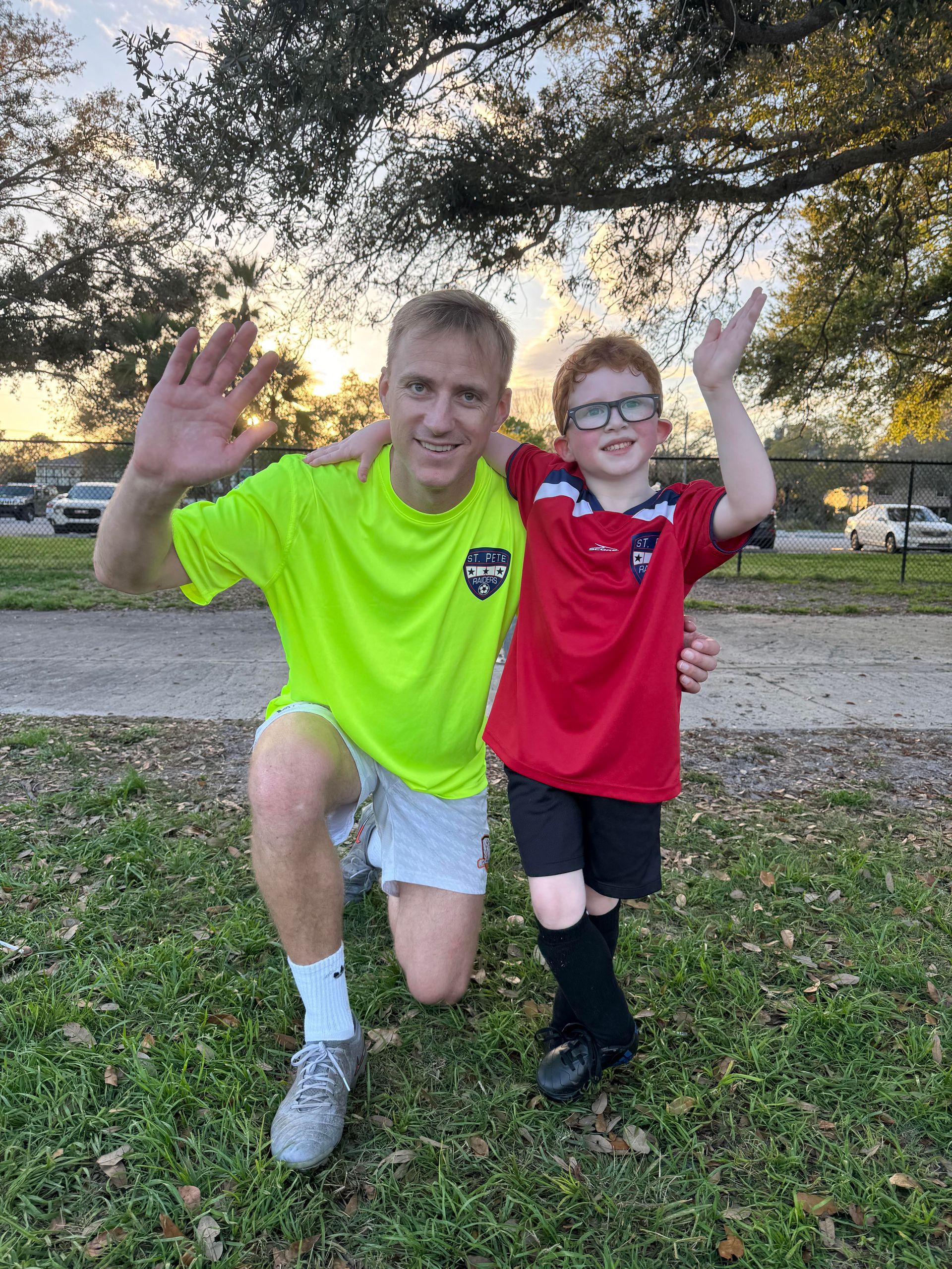 St. Pete Raiders player with coach