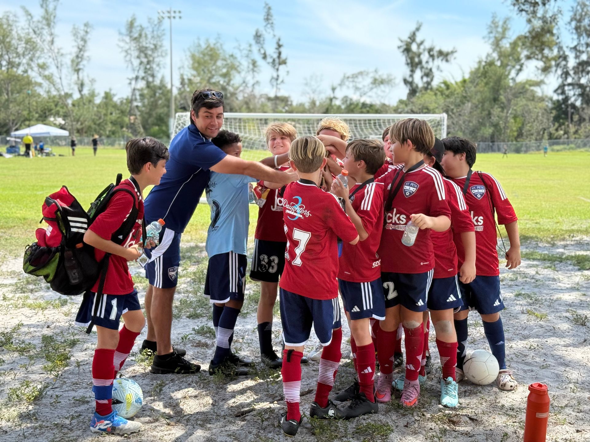 St. Pete Raiders team in a huddle