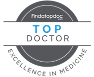 Findatopdoc logo with “Top Doctor” in blue and gray, and “Excellence in Medicine” in a circular badge.