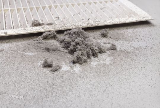 Dirty Air Filter And Dust Pile