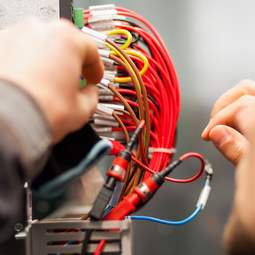 Electrician Fixing The Electrical Wiring Electrician Fixing The Electrical Wiring