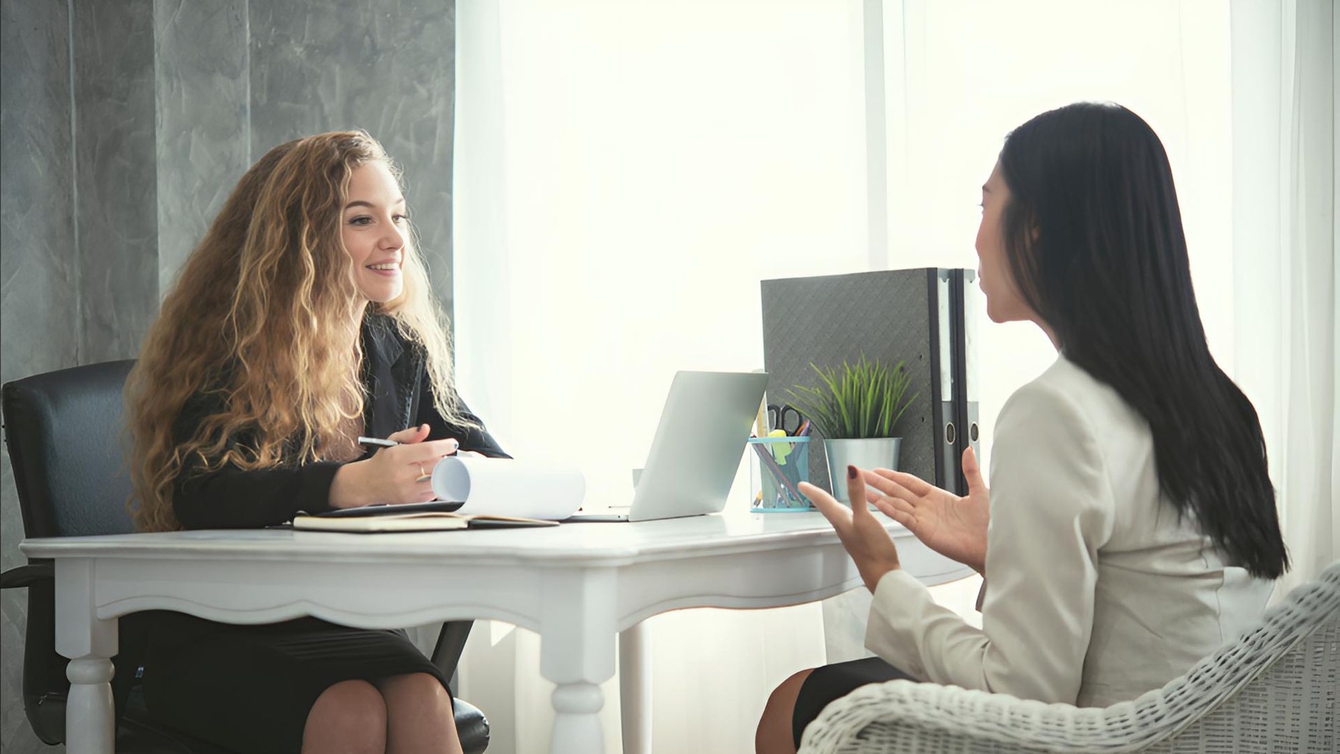 Two Women Are Sitting — Bee HR in Narara, NSW