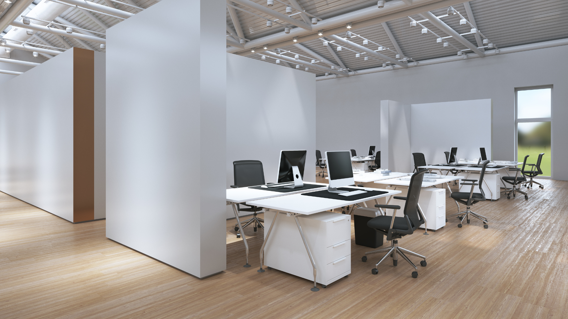 An empty office with a lot of desks and chairs