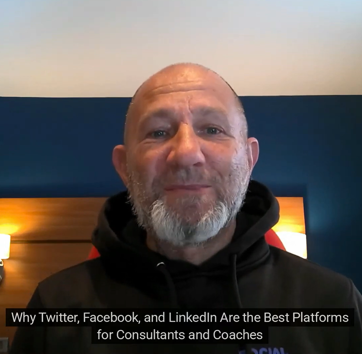 Man with gray beard in front of blue wall discussing social media platforms. Text: 