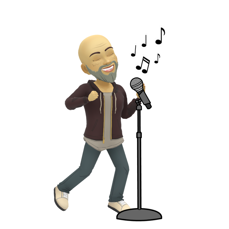 A man with a beard is singing into a microphone.