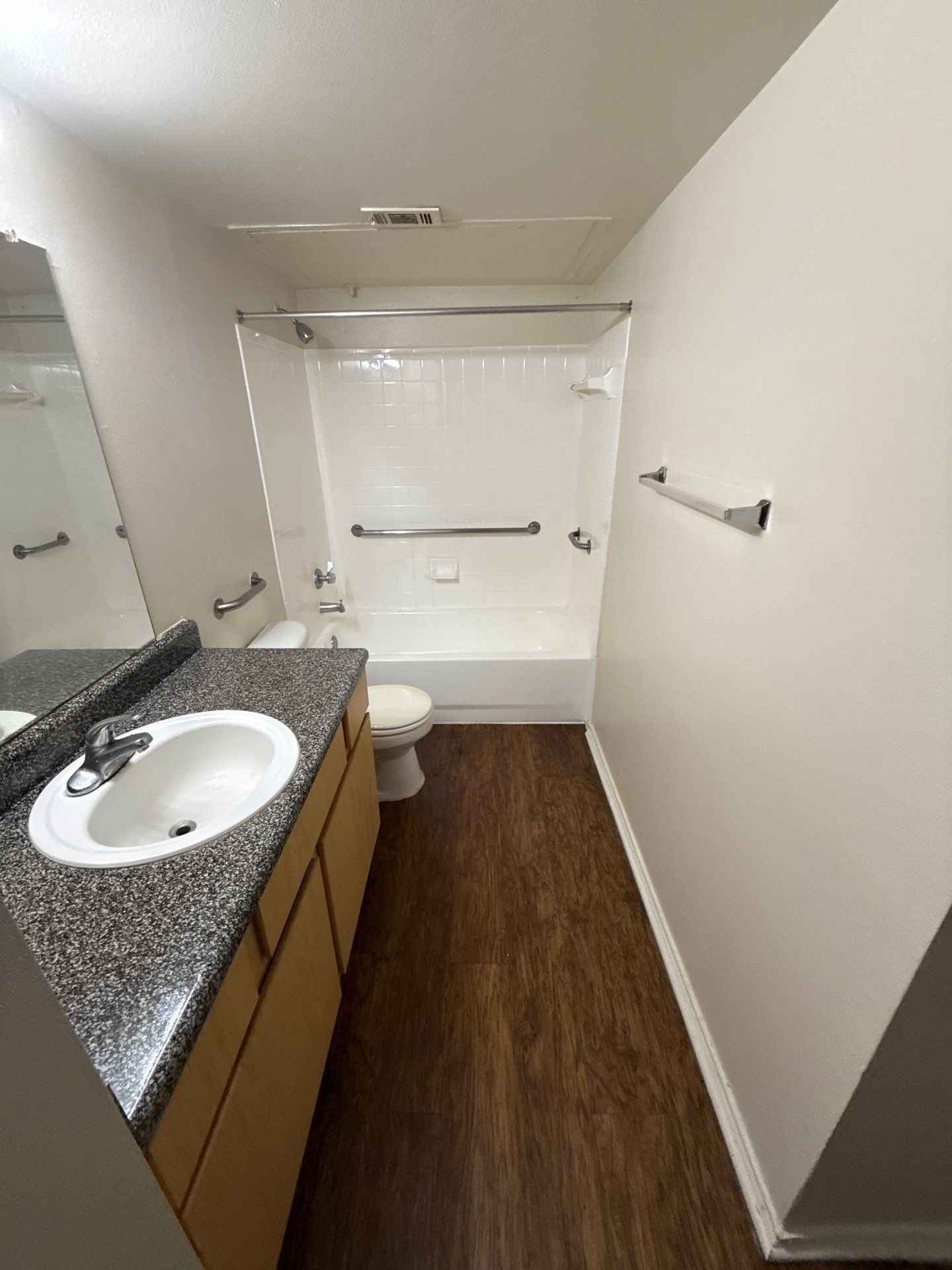 Clean, empty apartment bathroom after biohazard cleanup