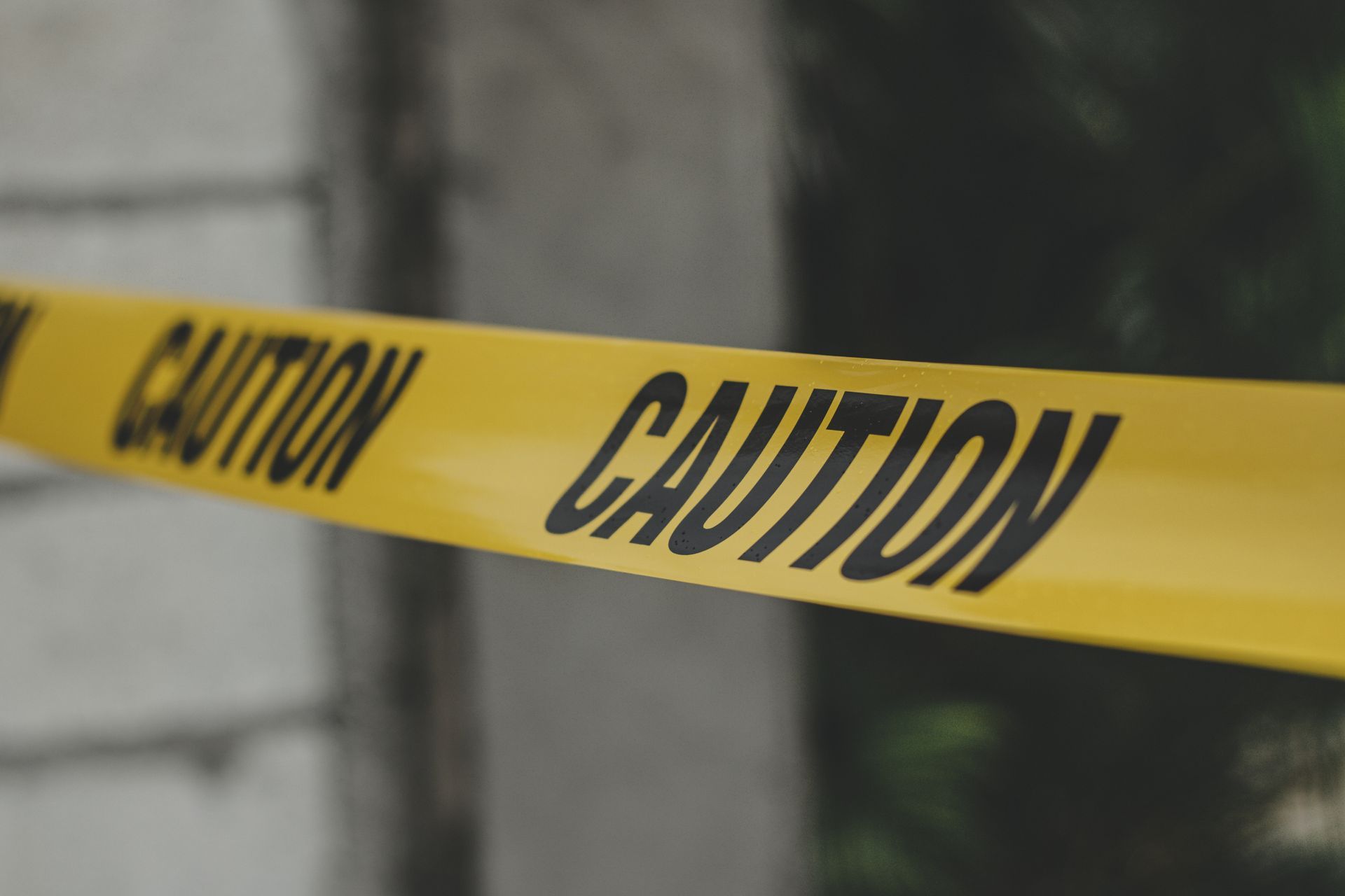 A close up of a yellow caution tape