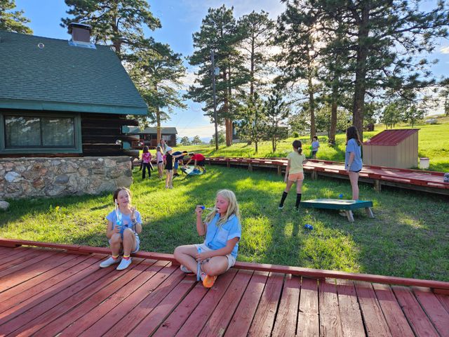 Campers enjoying outside games by Buckhorn Lodge
