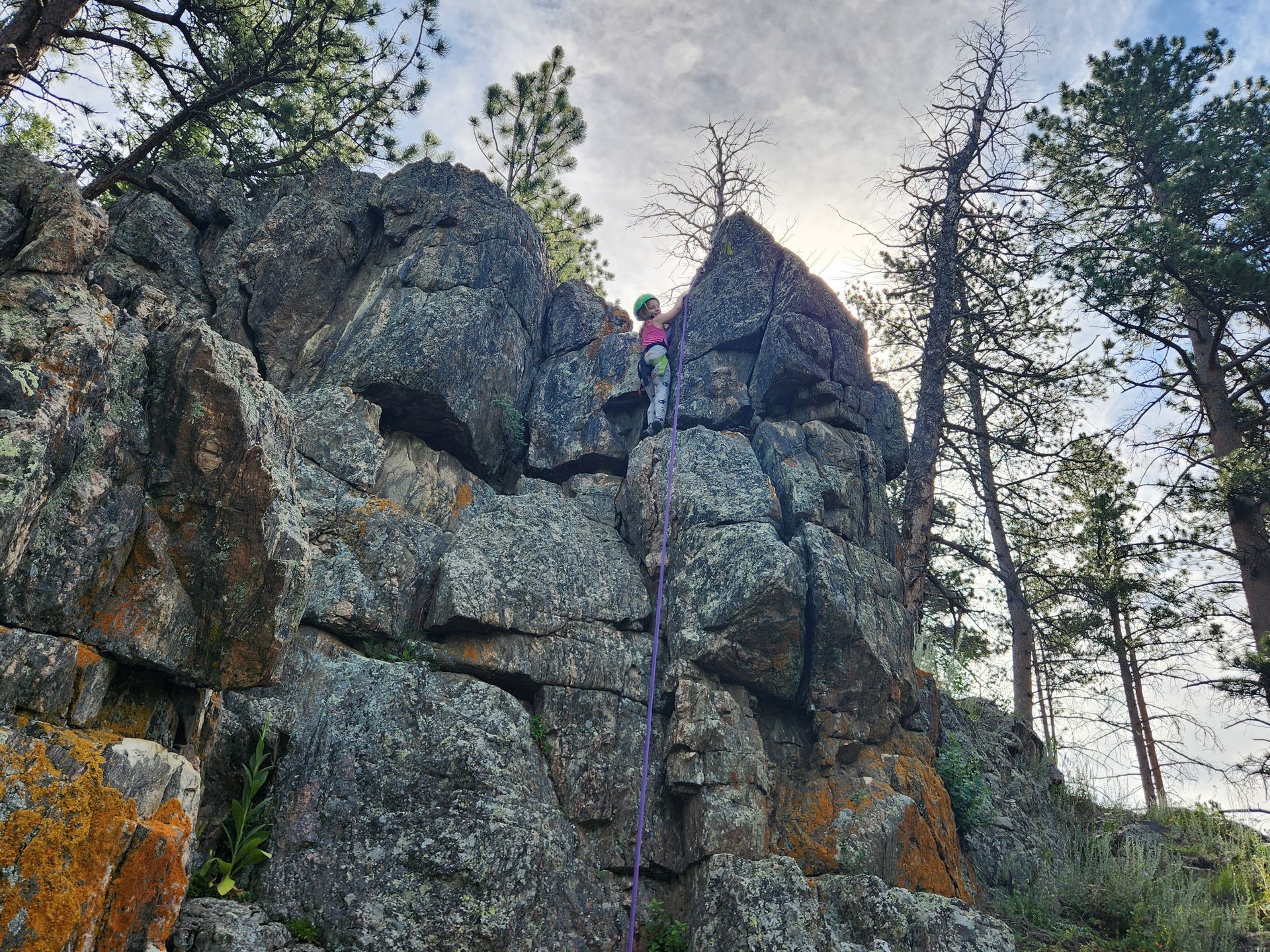 View of rock climbing on natural rock.