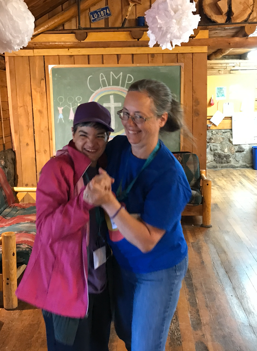 Camp Hope camper and counselor dancing.