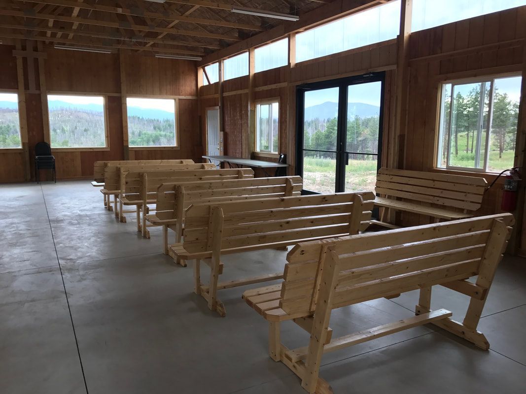 Inside view of benches in Bear Paw Barn.