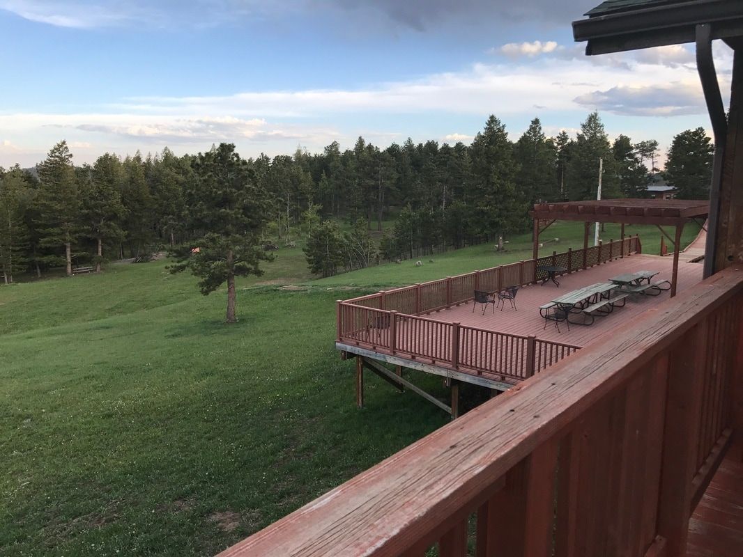 View of game field and lower deck from upper deck in Elkhorn Lodge.