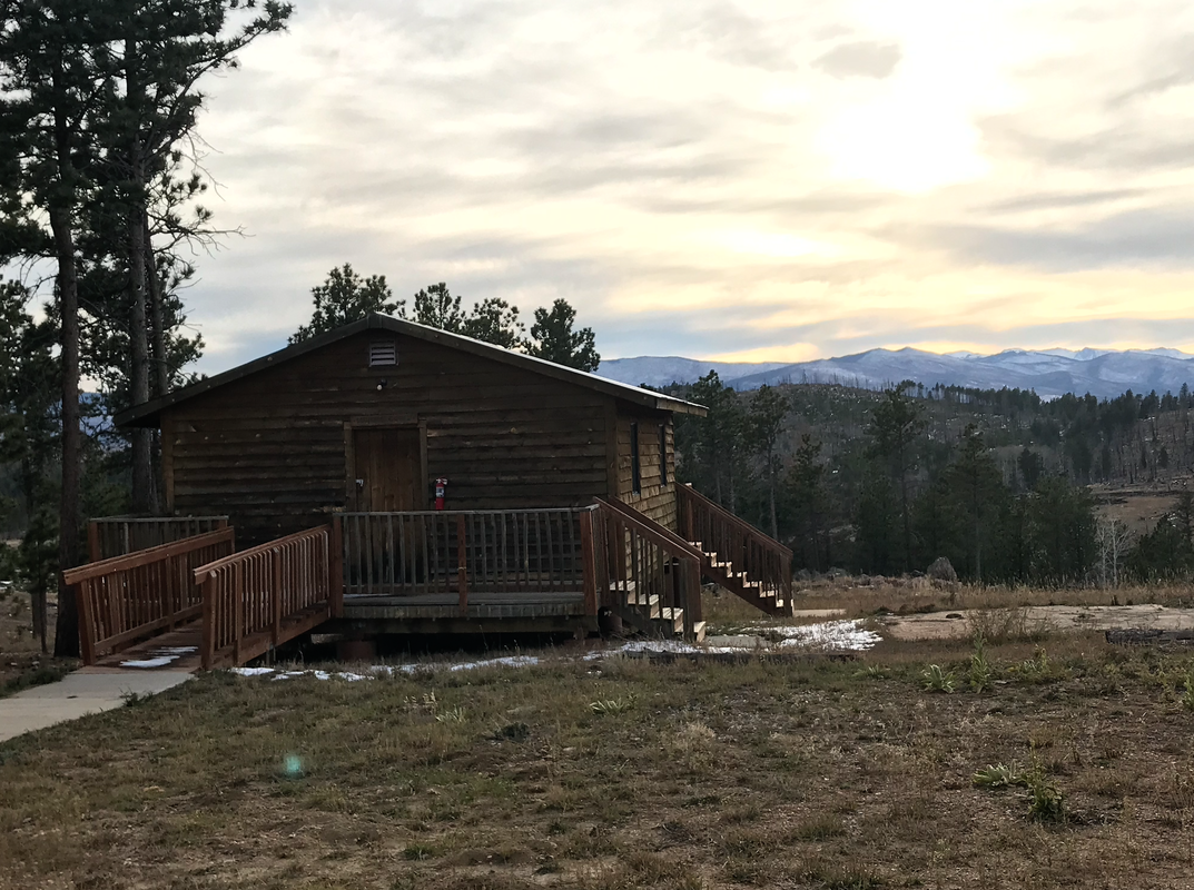 Closer exterior view of Miner's Cabin.
