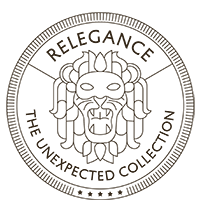 Circular black-and-white logo with a stylized lion face and the text “RELEGANCE” and “THE UNEXPECTED COLLECTION”