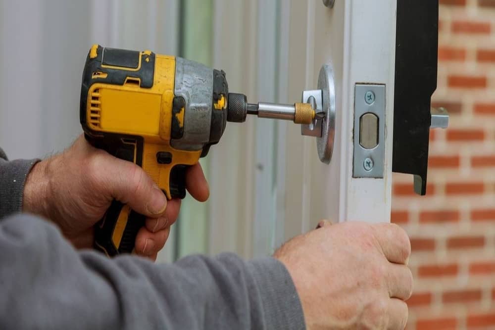 Repairing door lock with a drill — Chicago, IL — Ace Lock & Key Smith Repairing door lock with a drill — Chicago, IL — Ace Lock & Key Smith