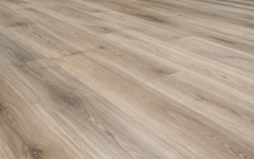 Light wood plank flooring with a subtle gray-beige grain pattern