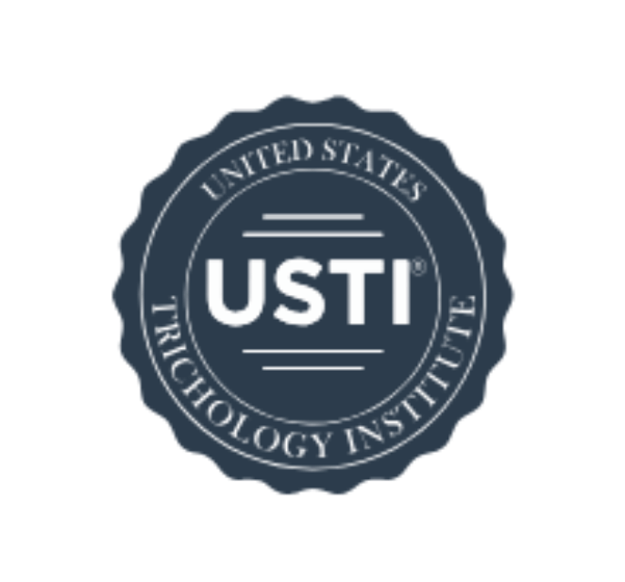 USTI logo: dark blue circular seal with white text “United States Trichology Institute”