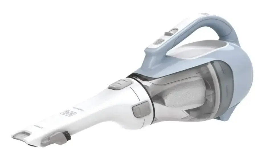A black and decker handheld vacuum cleaner is sitting on a white surface.