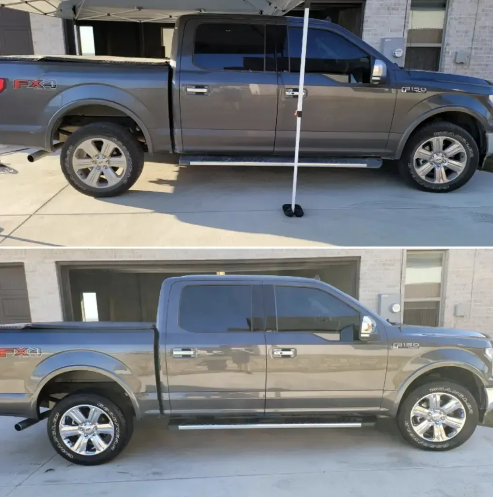 A ford truck is parked in front of a building
