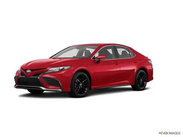 A red toyota camry is shown on a white background.