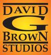 David G. Brown Studios logo on orange gradient background. Black text and stylized “G” shape.