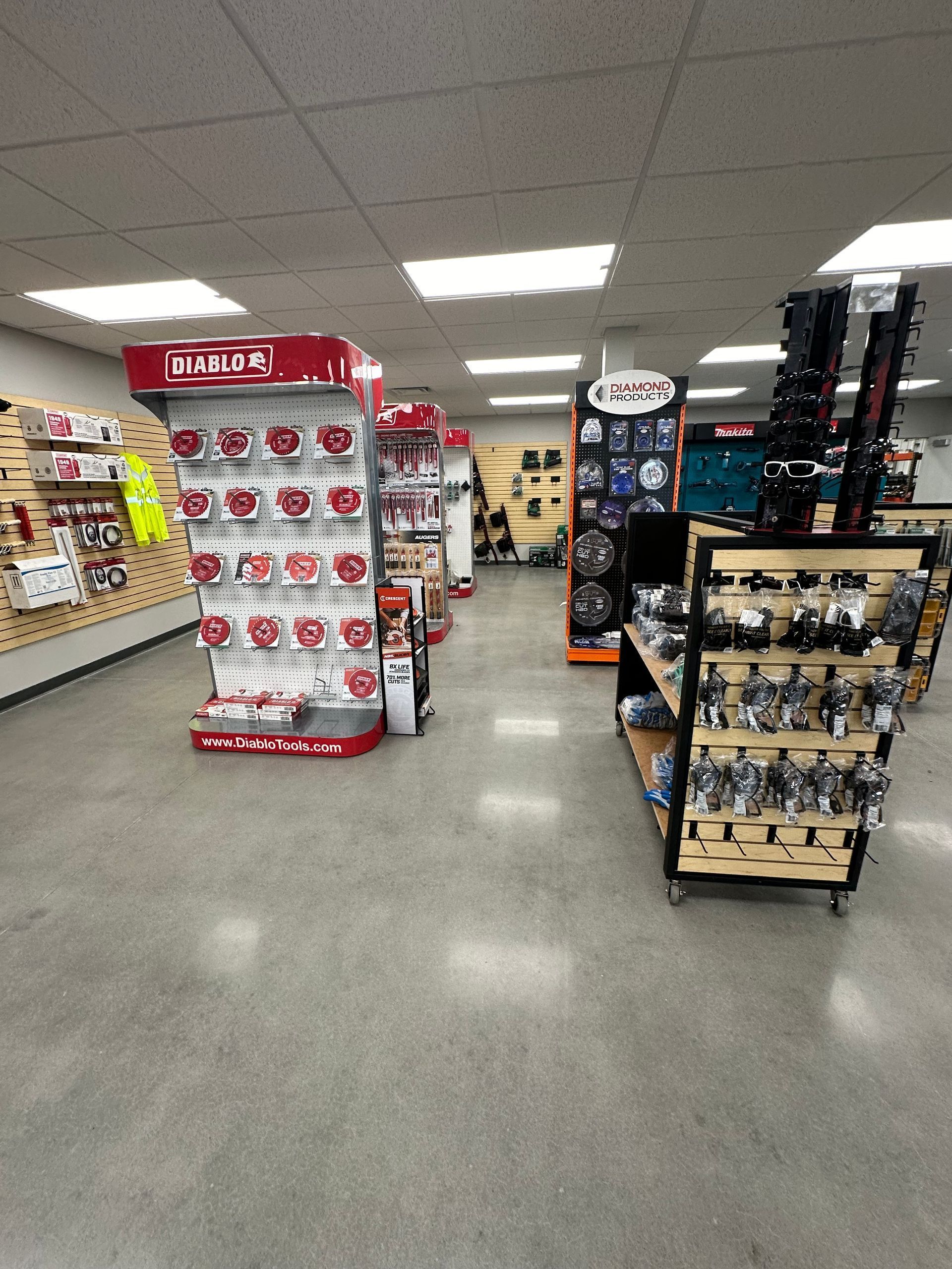 Store aisle with snack displays and shelves in a retail shop interior