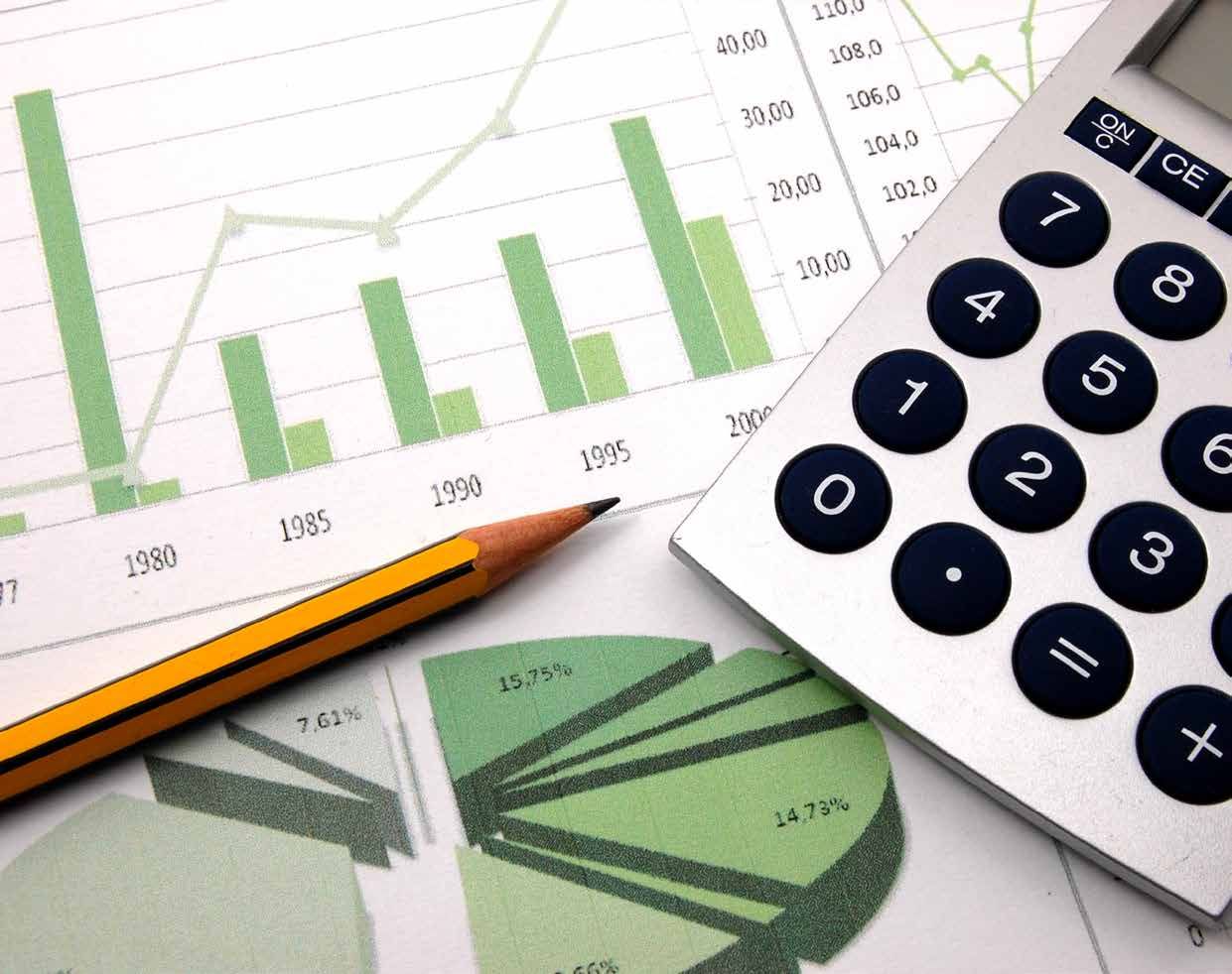 A calculator and a pencil on top of a graph