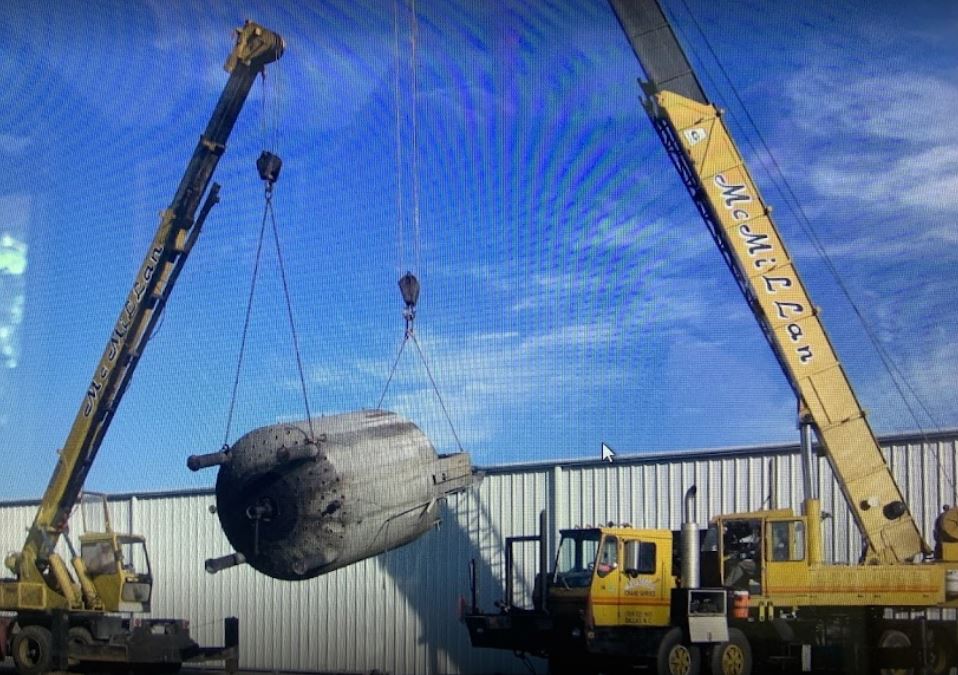 Crane Lifting A Tank - Dallas, NC - McMillan Crane Services Inc.