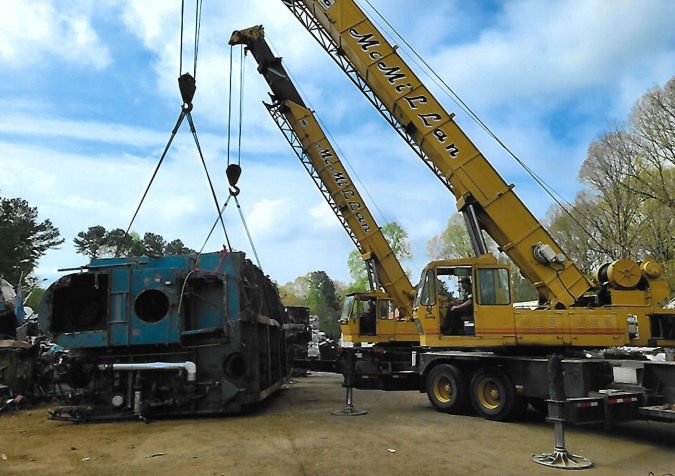McMillan cranes lifting metal
