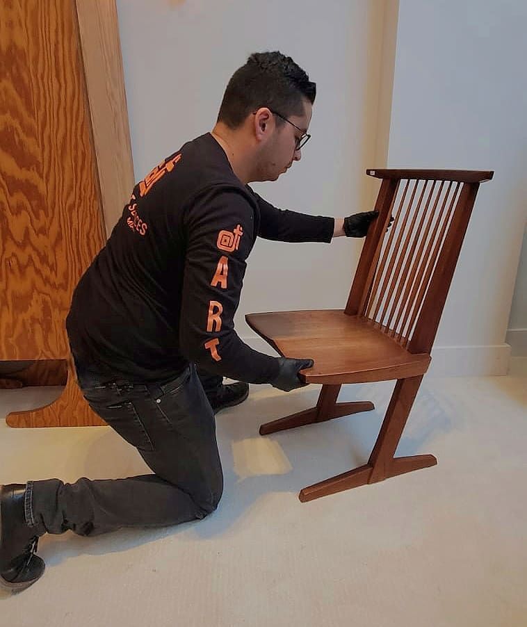 OTI's Mario Franco placing a design piece