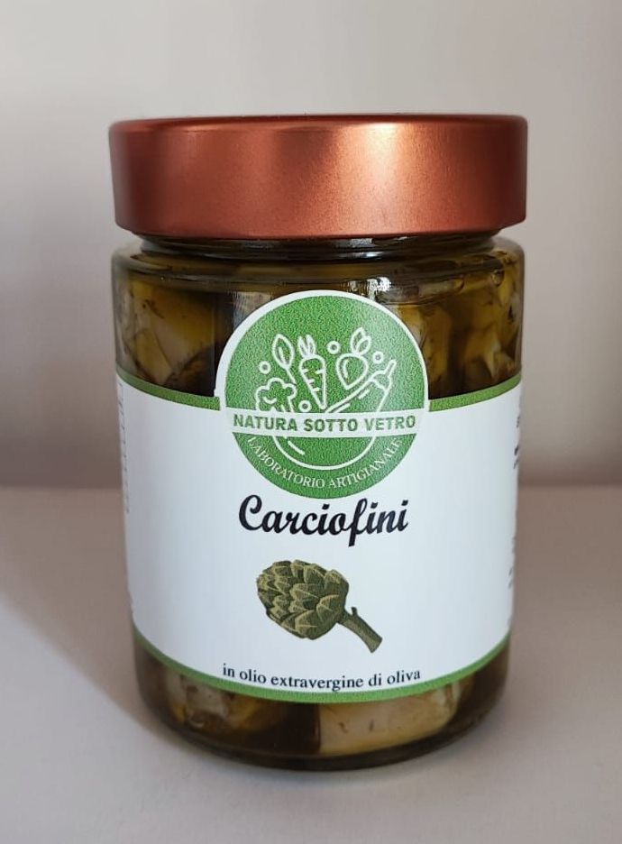 Barattolo di vetro contenente zucchine candite verdi, etichettato