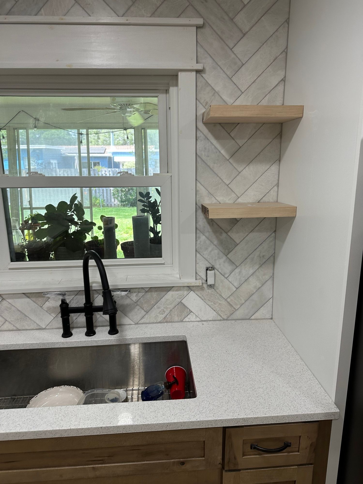 newly installed kitchen faucet and skin