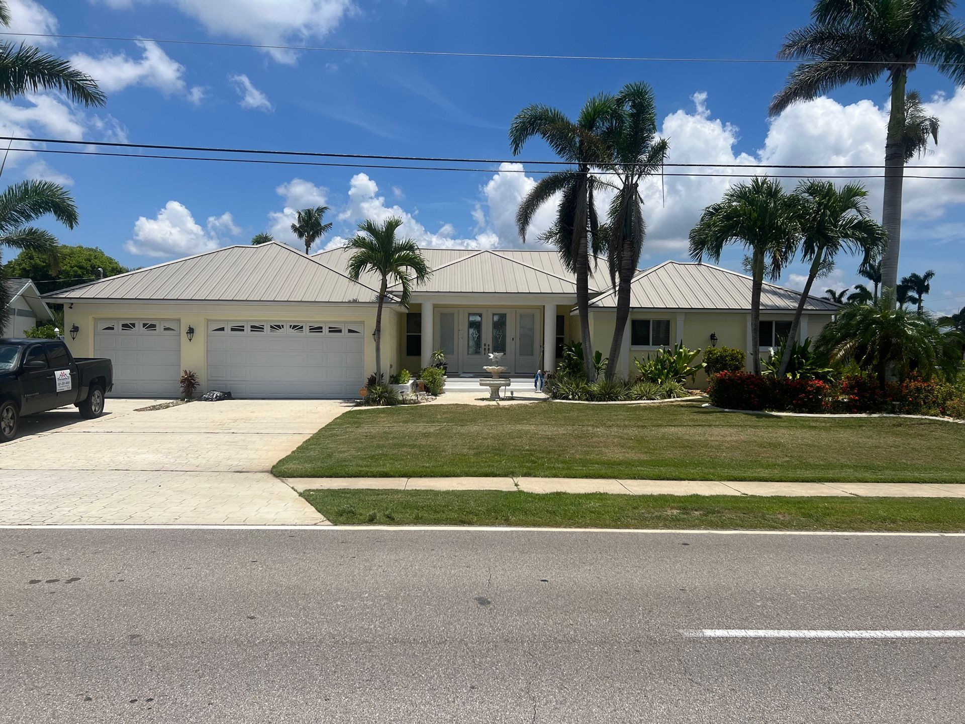 Local Home Featuring Shingle Roofing Surface and Palm Trees